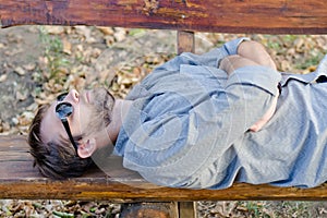 Sleeping man with sunglasses