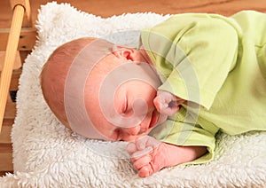 Sleeping newborn baby boy