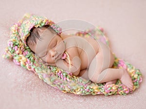 Sleeping newborn baby girl