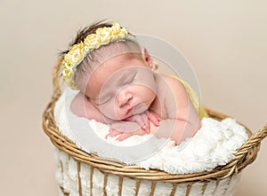 Sleeping newborn baby girl