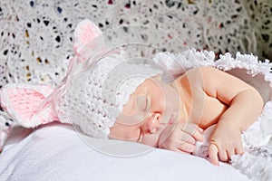 Sleeping newborn baby girl