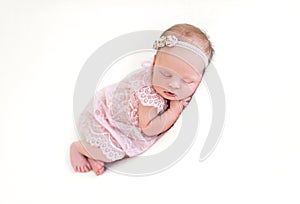 Sleeping newborn baby girl