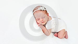 Sleeping newborn baby girl