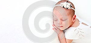 Sleeping newborn baby girl