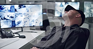 Sleeping, security guard and computer for surveillance, camera and cctv monitor for company safety. Desktop, technology