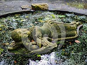 Sleeping thai lady statue at Suan Nai Dum Chumphon Thailand