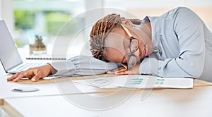 Sleeping, tired or burnout black woman in finance office with desk laptop or infographic documents. Exhausted