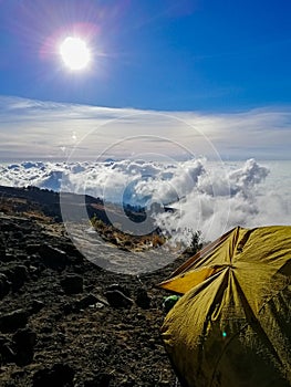 Sleeping on a volcano, waking up above the clouds. photo
