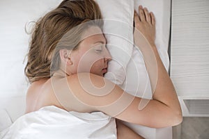 Sleeping woman in bed