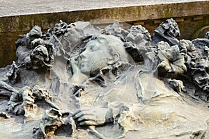 Sleeping woman sculpture at Monumental Cemetery, Milan