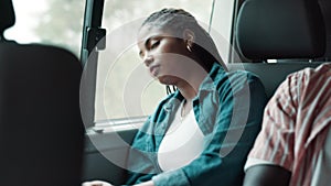 Sleeping woman, travel and road trip with friends in car for journey on summer holiday. Tired, female person or