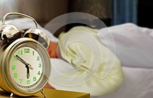 Sleeping Women and Alarm Clock