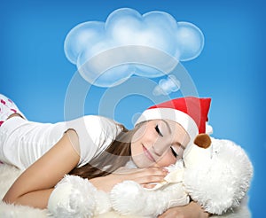 Sleeping young girl with teddy bear