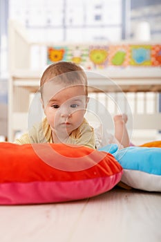 Sleepy baby on playmat