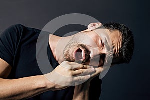 Sleepy man studio portrait