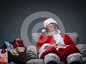 Santa Claus taking a nap photo