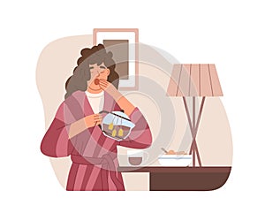 Sleepy woman yawning and drinking strong tea early in morning at home. Hard wakening of drowsy tired person. Female's photo