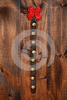 Sleigh bells with red bow