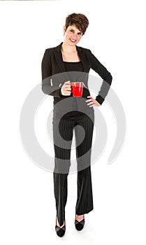 Slender businesswoman wit a cup of coffee