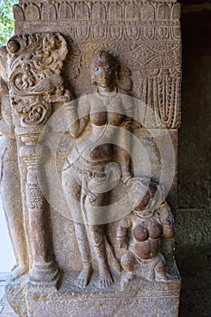 Slender lady in a lovely posture. Nandi mandapa, Virupaksha Temple