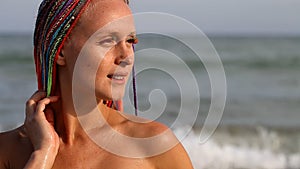 Slender young girl on the coast