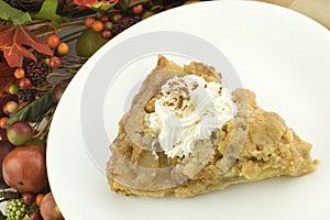 A Slice of Apple Pie with Fall Decorations