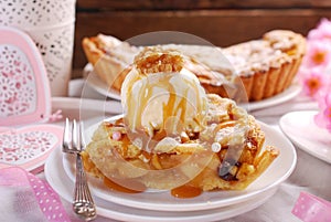 Slice of apple pie with vanilla ice cream