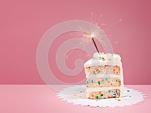 Slice of Birthday Cake with Sparkler photo