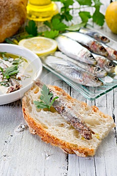 Slice bread with anchovy photo