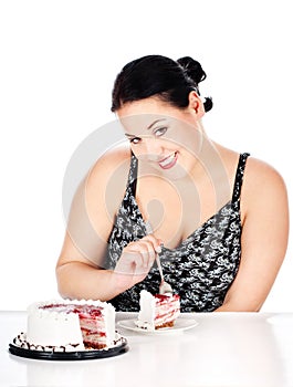 Slice of cake and chubby woman photo
