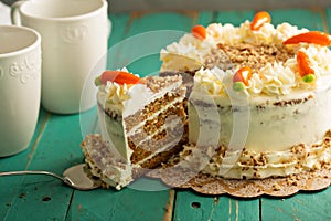 Slice of carrot cake with cream cheese frosting