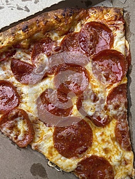 Slice of Carryout Pepperoni Pizza for Lunch photo