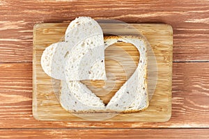 Slice of cereal toast bread with cut out heart