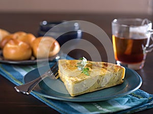 Slice of cheese and onion quiche