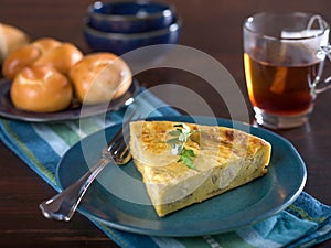 Slice of cheese and onion quiche