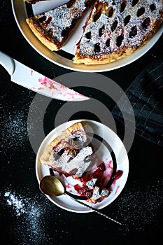 Slice of cherry pie on a plate