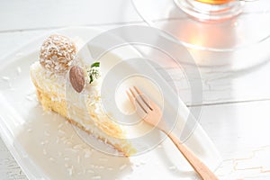 Slice Of Coconut Cake With Afternoon Tea