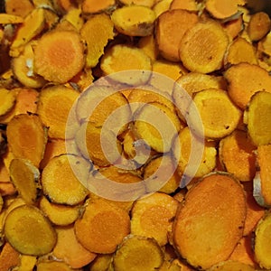 slice cutted pices of wet turmeric photo