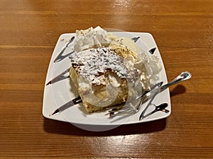 Slice of deep dish apple pie