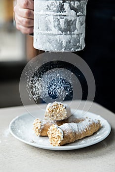 A slice of delicious cake. Piece of Cake on a Plate. Sweet food. Sweet dessert. Close up.