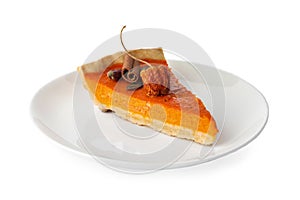 Slice of delicious homemade pumpkin pie isolated on white