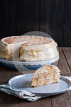 A slice of delicious salted caramel crepe cake