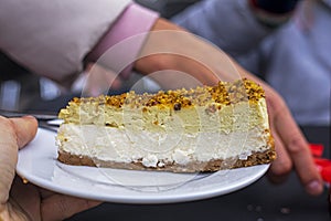 slice of fresh cheesecake topped