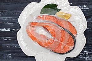 slice of fresh raw fish salmon on plate