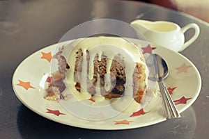 Slice of freshly baked apple crumble photo