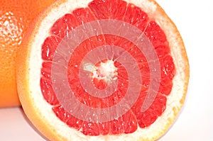 Slice of grapefruit close-up macro copy space