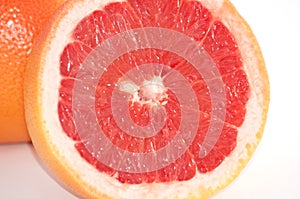 Slice of grapefruit close-up macro copy space