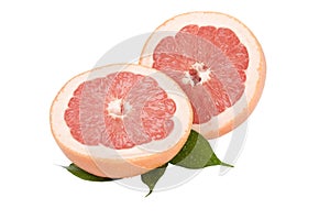 Slice Grapefruit with leaves on a white background