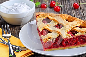 Slice of homemade sour cherry pie