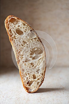 Slice of homemade sourdough bread. Close up